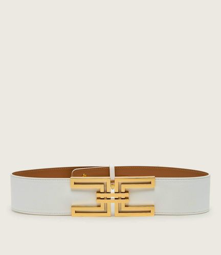 Wide belt with logo plaque