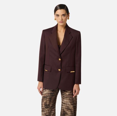 Cool wool jacket with jewel plaques