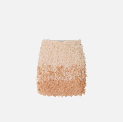 Tulle miniskirt with floral embroideries
