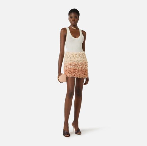 Tulle miniskirt with floral embroideries