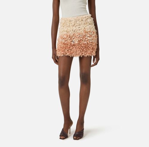 Tulle miniskirt with floral embroideries