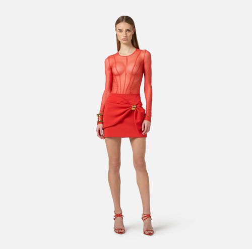 Miniskirt with jewel detail