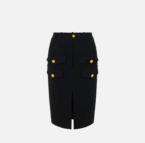 Gabardine skirt with flaps
