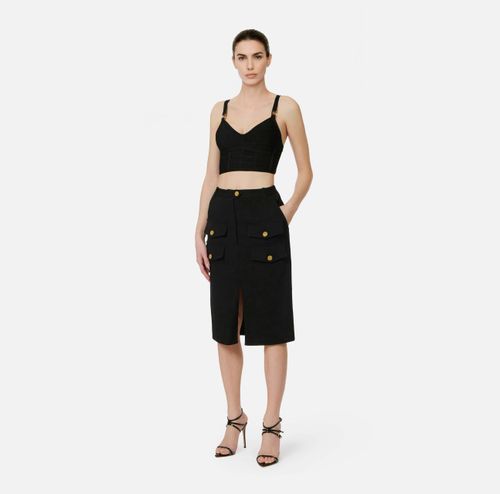 Gabardine skirt with flaps
