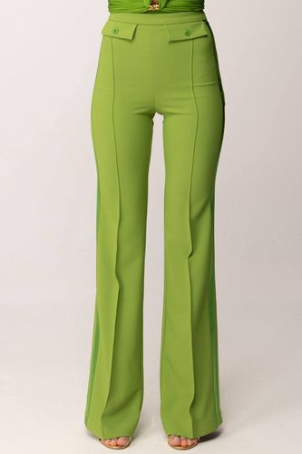 Trousers in lightweight crêpe and satin fabrics