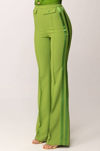 Trousers in lightweight crêpe and satin fabrics