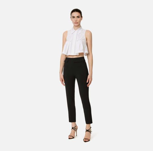Trousers in lightweight crêpe and satin fabrics
