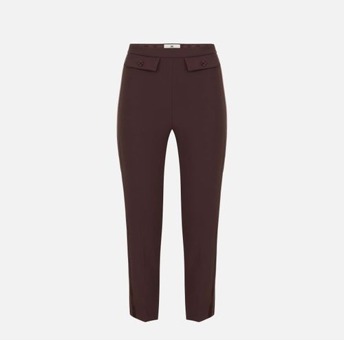 Trousers in lightweight crêpe and satin fabrics