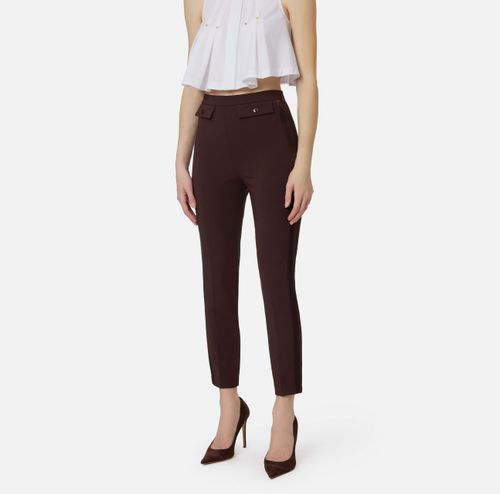 Trousers in lightweight crêpe and satin fabrics