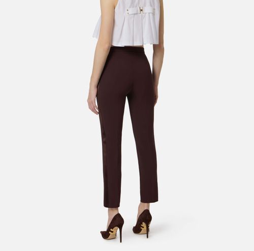 Trousers in lightweight crêpe and satin fabrics