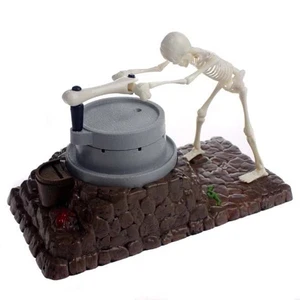קופת חיסכון למטבעות כסף בעיצוב שלד אדם