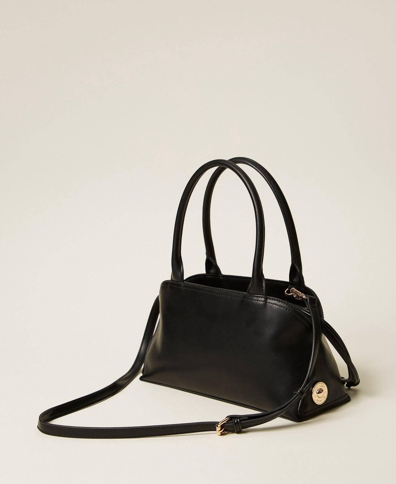 Bowler bag with printed clutch
