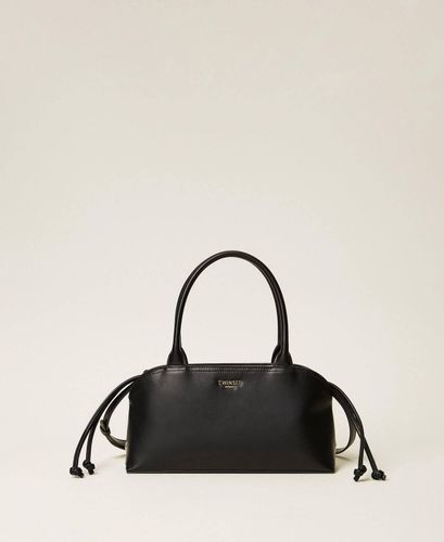 Bowler bag with printed clutch