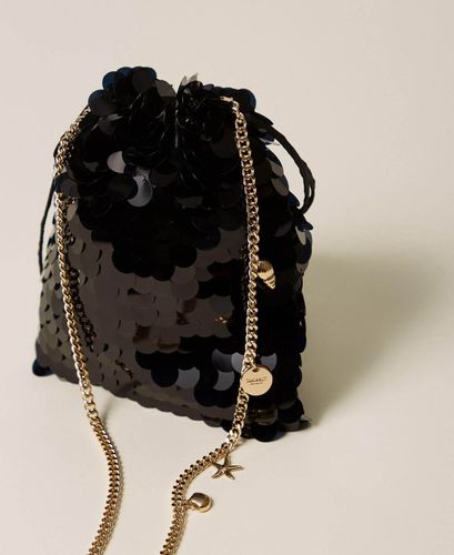 Satin clutch with sequins