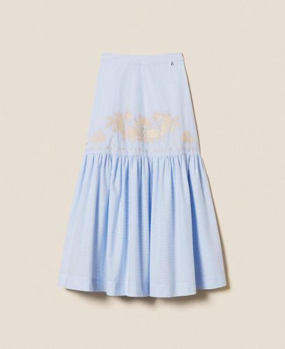 Long striped skirt with flounce and embroidery