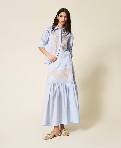 Long striped skirt with flounce and embroidery