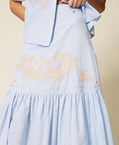 Long striped skirt with flounce and embroidery
