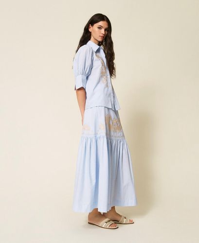 Long striped skirt with flounce and embroidery