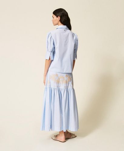 Long striped skirt with flounce and embroidery