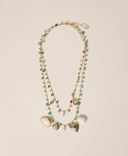 Set of necklaces with stones and charms
