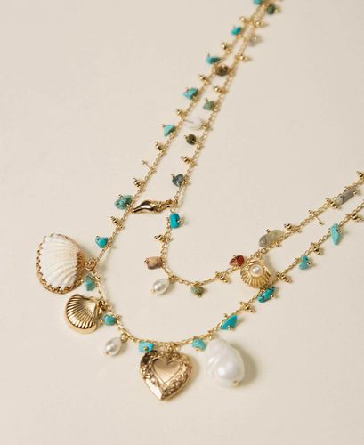 Set of necklaces with stones and charms