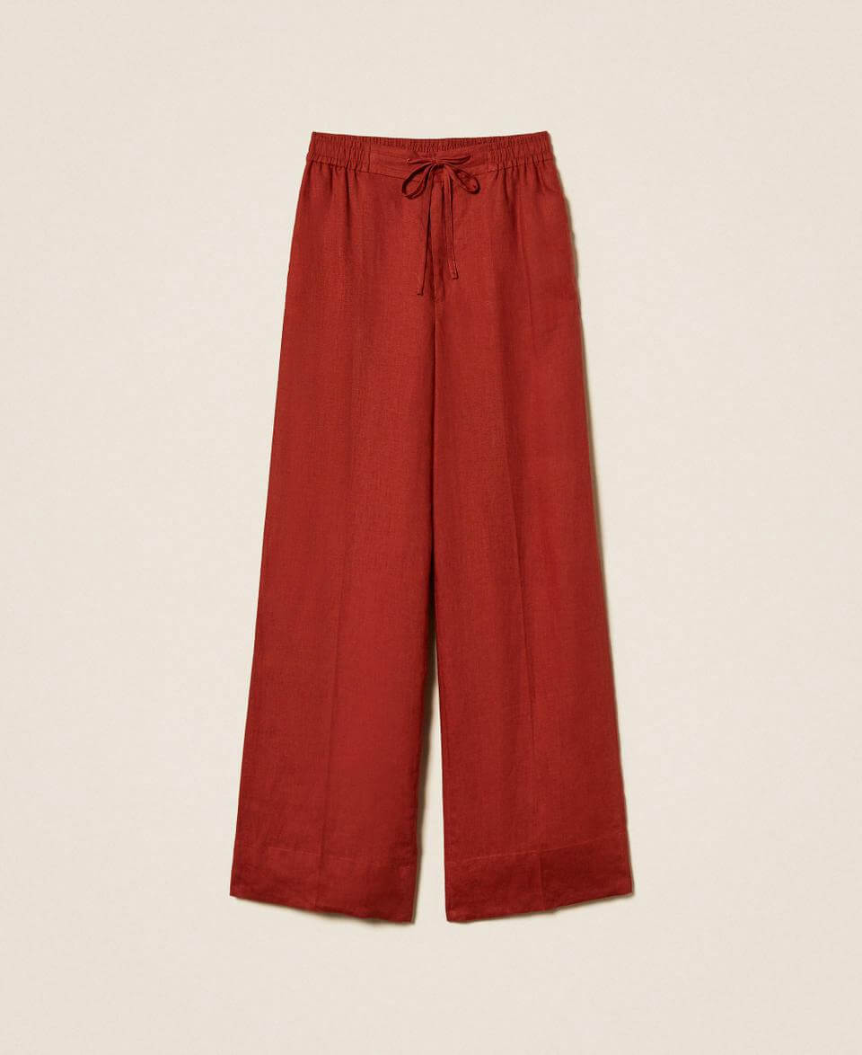 Linen trousers with embroidered logo