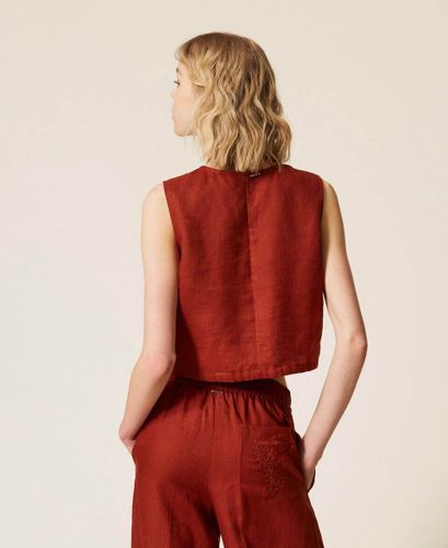 Linen top with embroidered logo