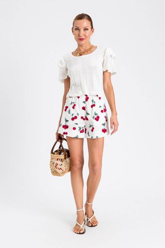 Fitted jumper with ruffles