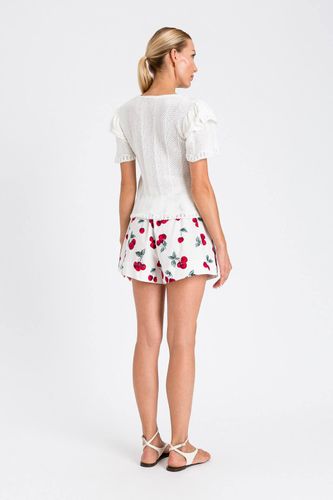 Fitted jumper with ruffles