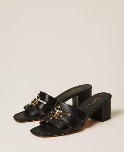 Leather mules with logo
