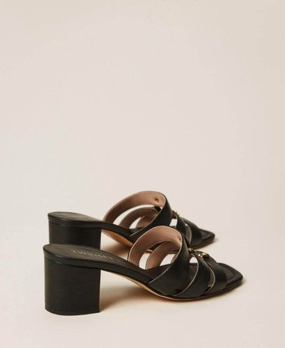 Leather mules with logo