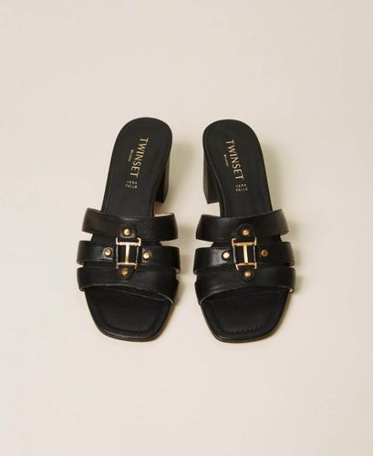 Leather mules with logo