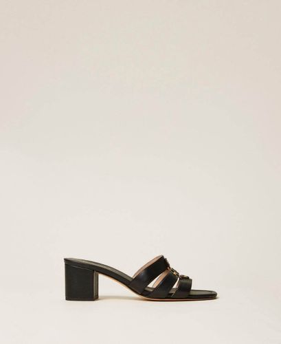 Leather mules with logo