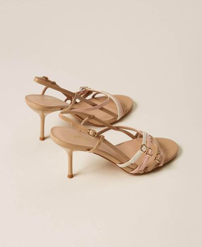 High heeled sandals with straps