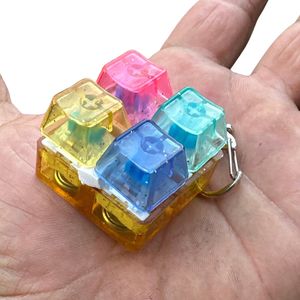 מחזיק מפתחות מקלדת לחצנים מאירים Fidget Toy 2x2