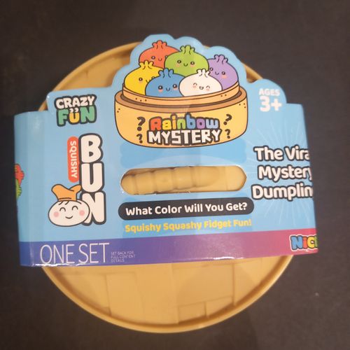 סקווישי דונאטס דאמפלינג לבן לוחצים ונהנים -  Dumpling Squishy