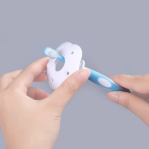 סט 2 מברשות שיניים הראשונות לתינוק מסיליקון עם מגן בטיחות - אפרסק