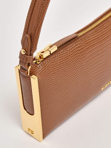 Over-the-shoulder bag with lizard print