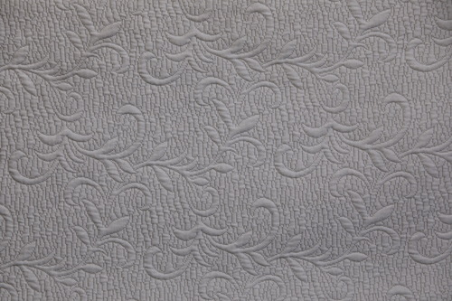 דוגמית בד אריגה פרחוני מקולקציית quilt מוקה