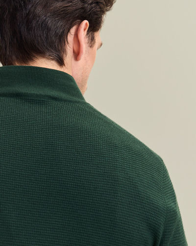 סוודר מצמר מרינו עם רוכסן צבע ירוק Forest green pure merino texture zip neck jumper