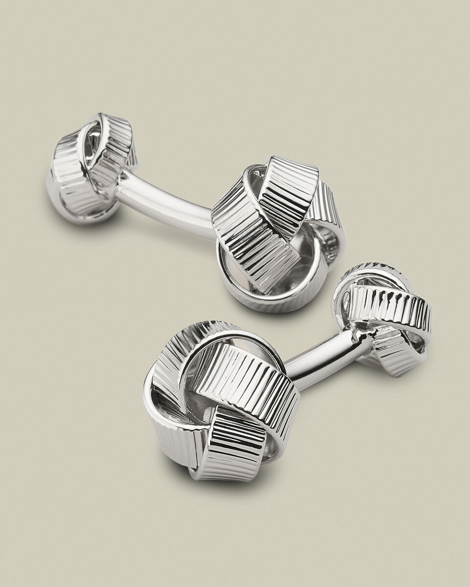 חפתים - Silver textured knot reversible cufflink 