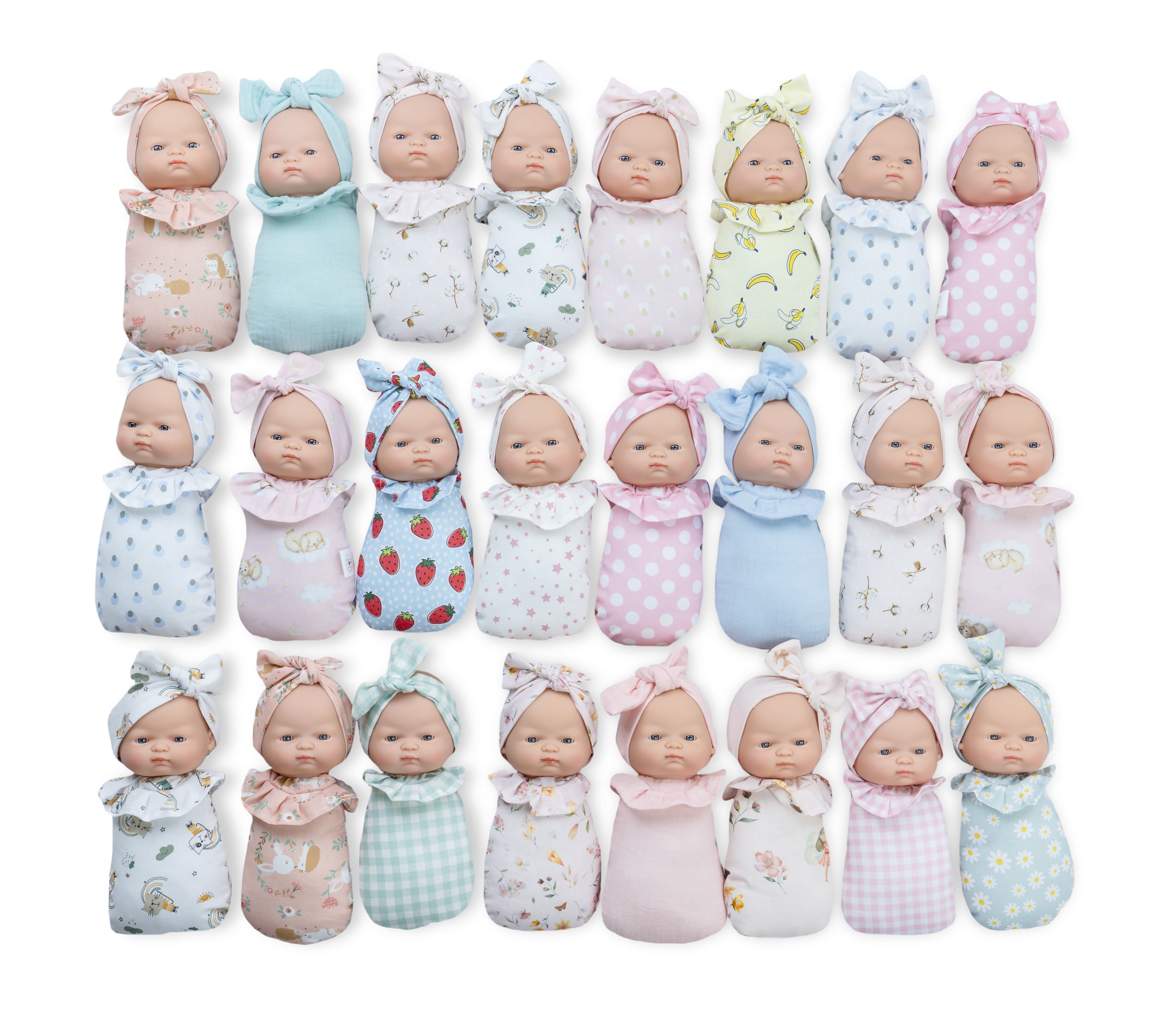 בובת תינוק ניו-בורן בעיטוף טטרס 20 ס"מ מסדרת Mini Sweets מבית Marina & Pau