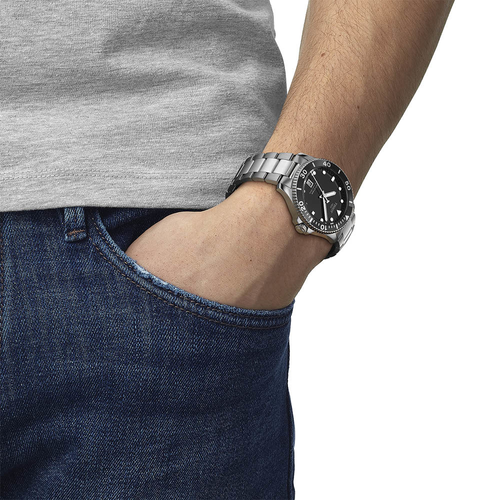 שעון TISSOT דגם T1204101105100 לגבר לוח שחור רצועת פלדת אל-חלד בצבע אפור – תמונה 2