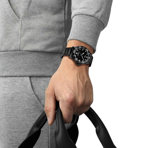 שעון TISSOT דגם T1204103305100 לגבר לוח שחור רצועת פלדת אל-חלד בצבע שחור – תמונה 2