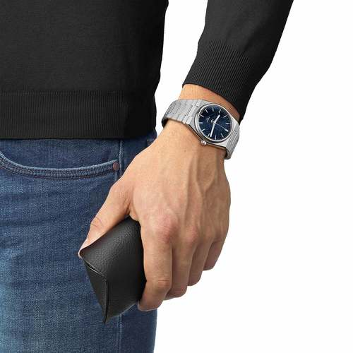 שעון TISSOT דגם T1374071104102 לגבר לוח כחול רצועת פלדת אל-חלד בצבע אפור – תמונה 2