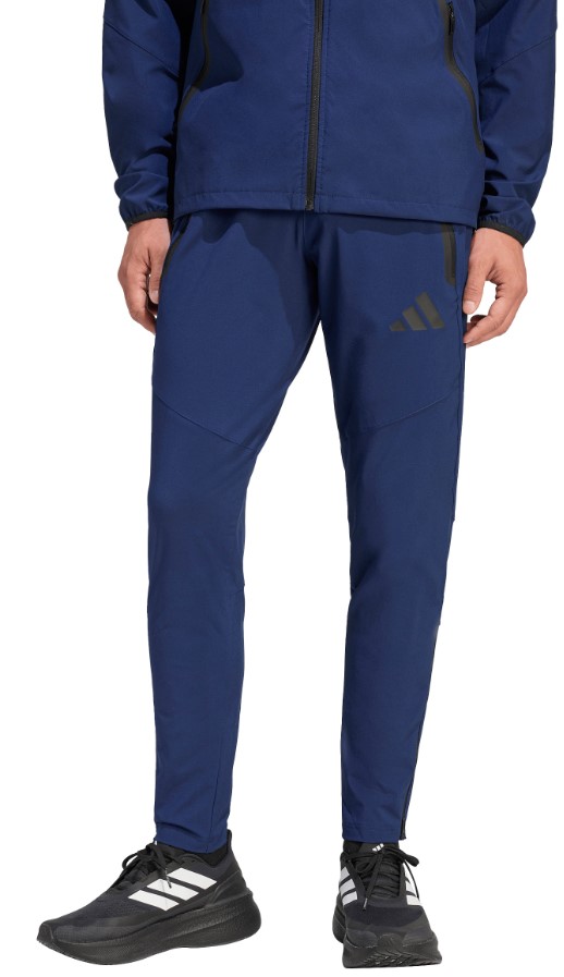מכנסי אדידס adidas Tiro Travel Woven Tracksuit Bottoms | גברים