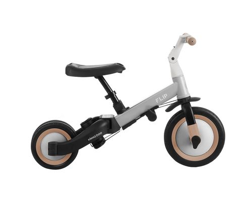 תלת אופן Flip אפור במבט צידי, בתצורת אופניים עם דוושות פעילות.