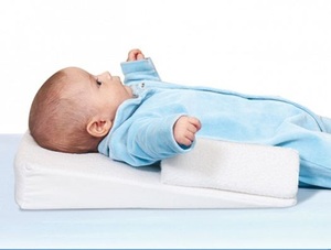 מיקומון ושיפועון לטיפול בריפלוקס לתינוק