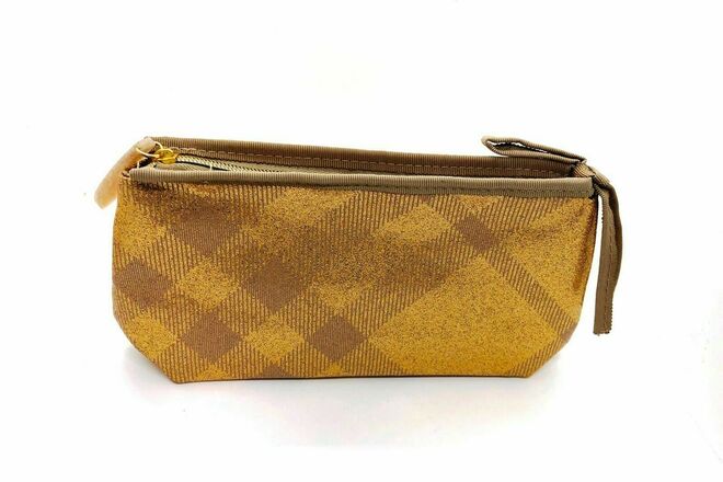 תיק רחצה ברברי בצבע זהב BURBERRY GOLD SHOWER BAG