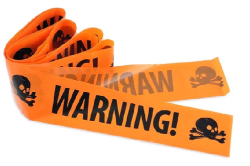סרט אזהרה כתום עם הכיתוב 'Warning' להאלווין